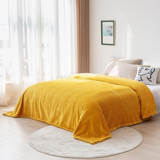 DISSA Fleece Blanket Twin Size – 60x80, Yellow - Soft, Plush, Fluffy, Fuzzy, Warm, Cozy – Perfect Throw for Couch, Bed, Sofa - with Pompom Fringe - Flannel Blanket
