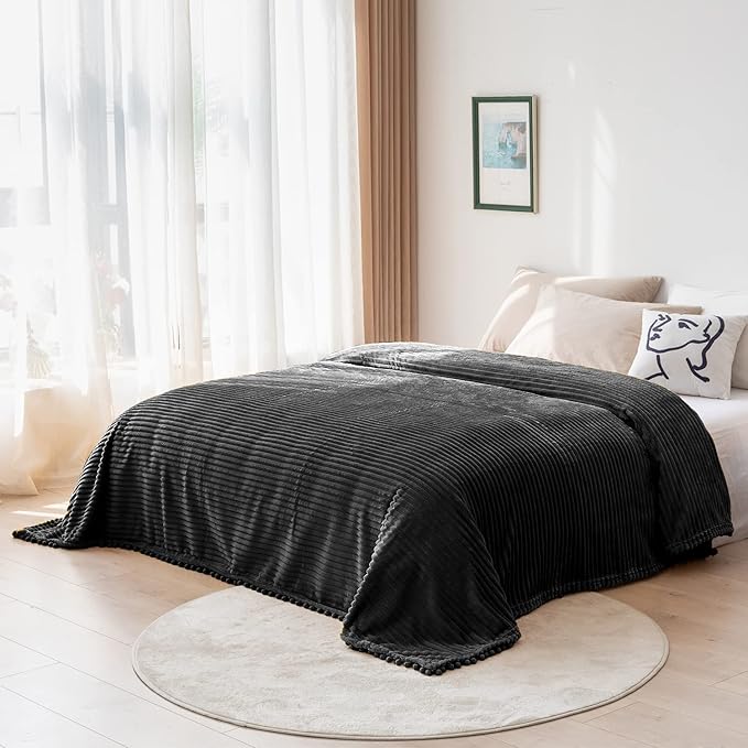 DISSA Fleece Blanket Throw Size ?€? 51x63, Black ?€? Soft, Plush, Fluffy, Fuzzy, Warm, Cozy ?€? Perfect Throw for Couch, Bed, Sofa - with Pompom Fringe - Flannel Blanket Throw Blanket