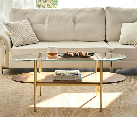 Shrine Oval Coffee Table, Mid-Century Modern Design, 2-Tier Structure, Clear Glass Top and Walnut MDF Shelf, 47" D x 21" W x 17" H, Sleek Conical Metal Legs with Gold Finish