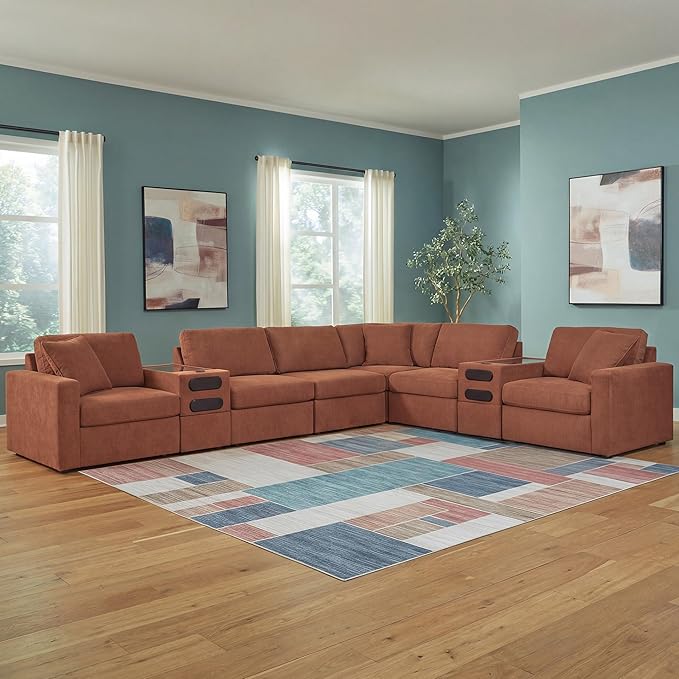 Signature Design by Ashley Modmax Contemporary Stain Resistant Right-Arm Facing 8-Piece Sectional with Audio Consoles, Armrest, Throw Pillows, Reversible Cushions and USB Port, Orange