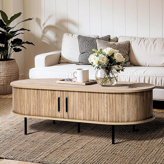 LuxenHome Oval Coffee Table with Storage, 47" Mid Century Modern Fluted Coffee Tables for Living Room, Wooden Sliding Door Boho Storage Center Table for Home, Office